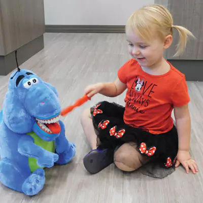 Gladstone Patient Learning About Dental Health